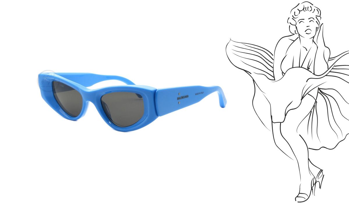 Budite primijećeni s Balenciaga mačkastim sunčanim naočalama s masivnim plastičnim okvirom u predivnoj royal blue boji. 